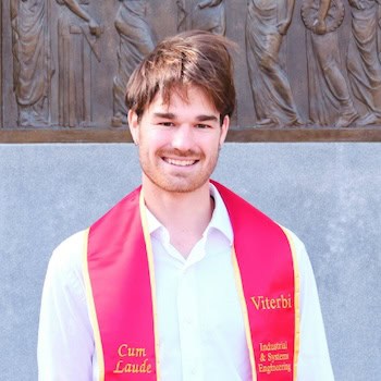 Christopher Doehring smiles and poses for a portrait