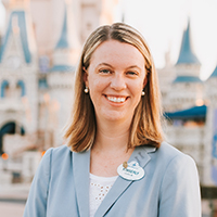 Kimberly Poniatowicz in front of Disney Castle